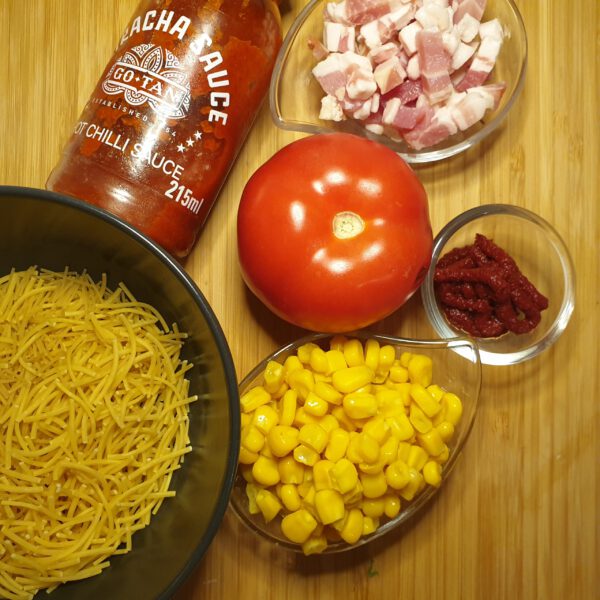 Maïssoep met tomaat
